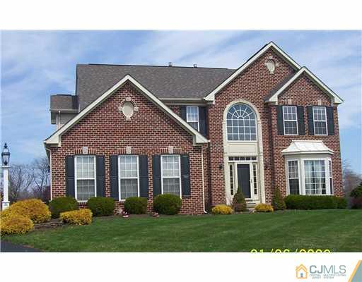 24 Sunflower Road Somerset, NJ 08873 - Photo 1 of 15 a front view of a house with a yard