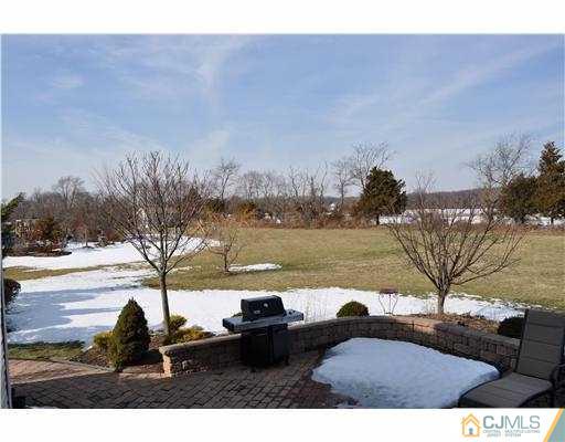 24 Sunflower Road Somerset, NJ 08873 - Photo 15 of 15 a view of a lake and outdoor space