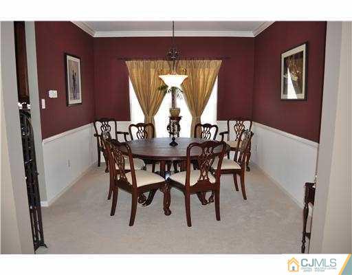 24 Sunflower Road Somerset, NJ 08873 - Photo 6 of 15 a dining room with furniture and window