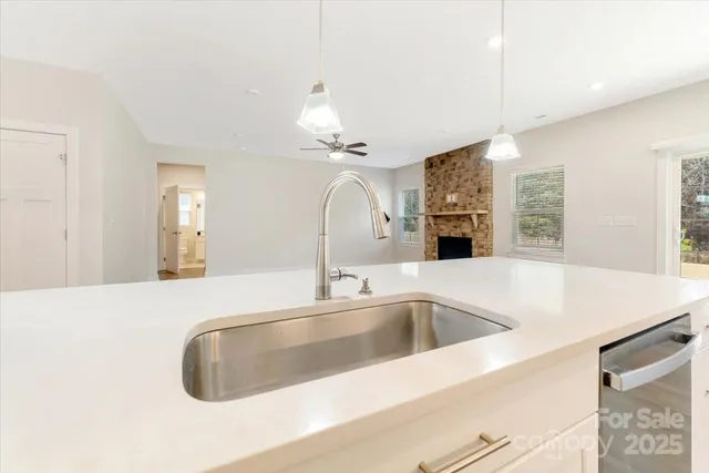 a bathroom with a sink a vanity and mirror