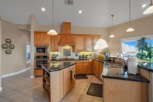 a bathroom with a tub and sink