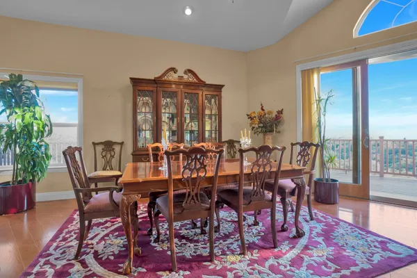 a bedroom with a bed and a flat tv screen