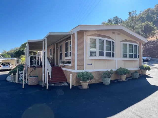 a front view of a house with patio