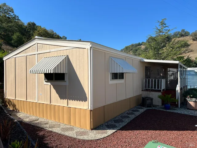 a view of a house with a balcony