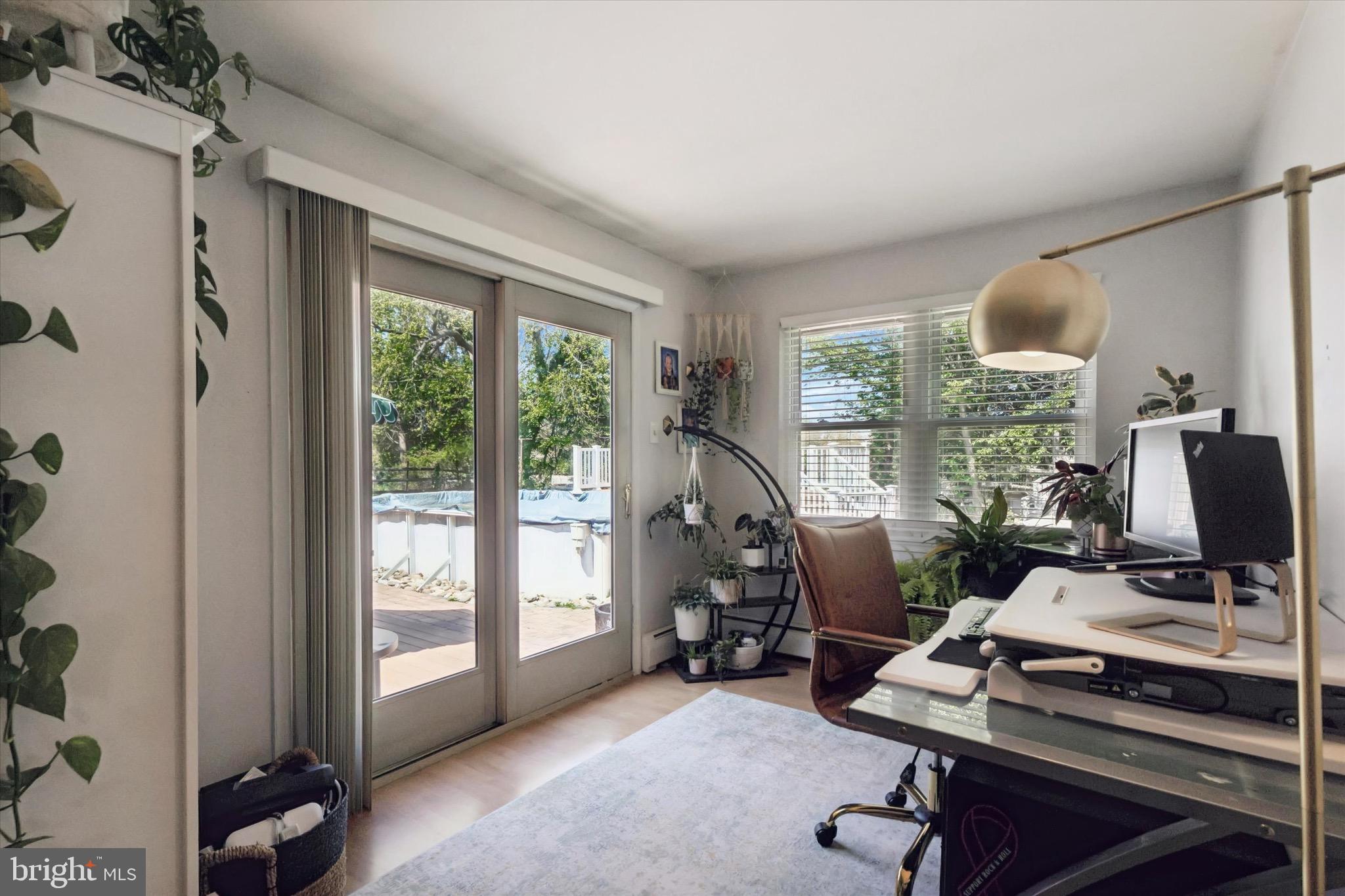 134-7 East 7 Stars Road Phoenixville, PA 19460 - Photo 11 of 25 a view of a workspace with furniture and a window