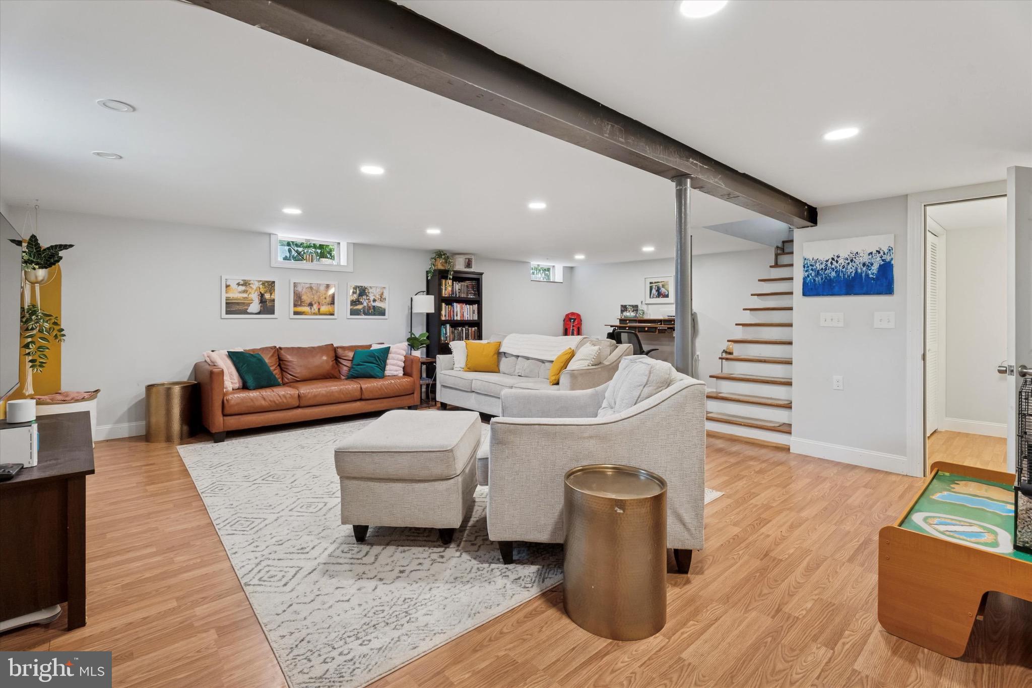134-7 East 7 Stars Road Phoenixville, PA 19460 - Photo 16 of 25 a living room with furniture and a wooden floor