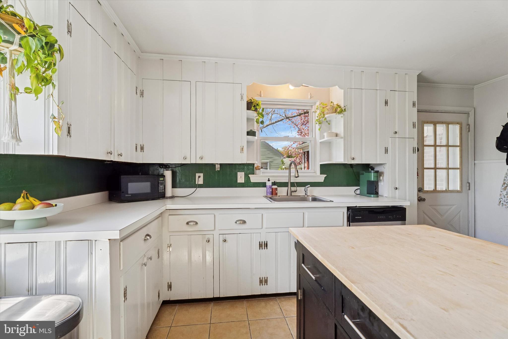 134-7 East 7 Stars Road Phoenixville, PA 19460 - Photo 3 of 25 a kitchen with white cabinets and window