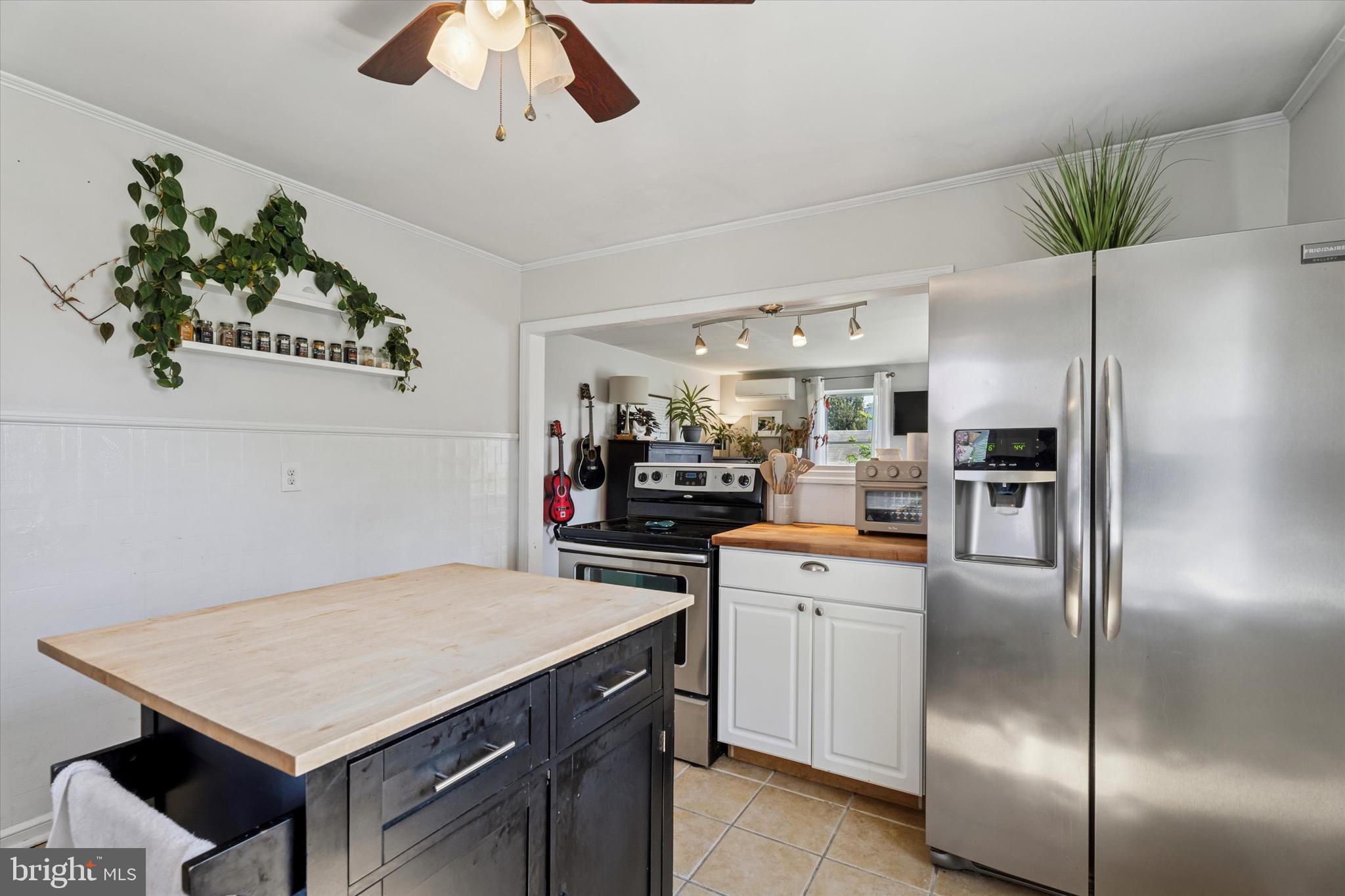 134-7 East 7 Stars Road Phoenixville, PA 19460 - Photo 5 of 25 a kitchen with kitchen island a counter space a sink appliances and cabinets