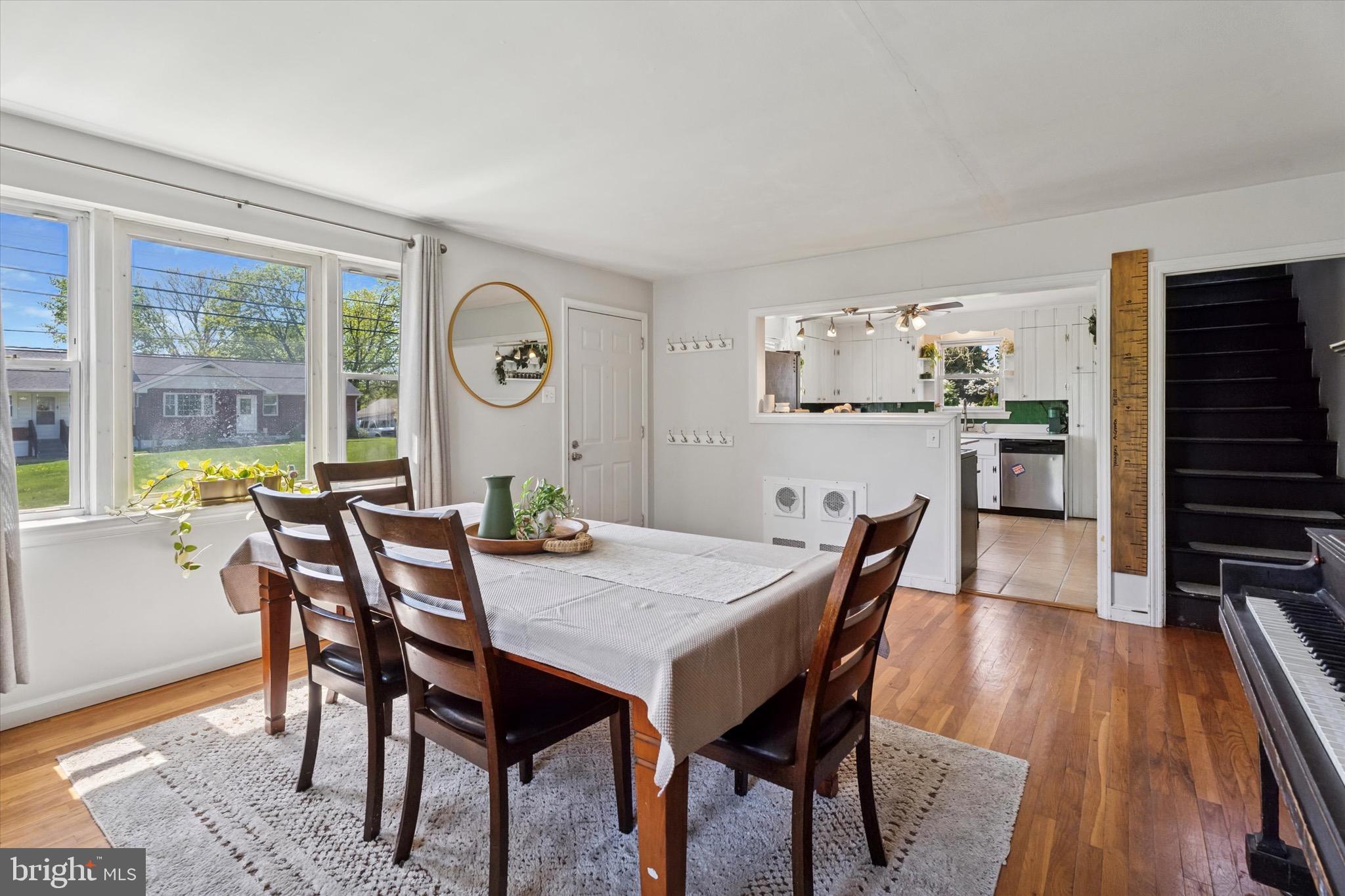 134-7 East 7 Stars Road Phoenixville, PA 19460 - Photo 6 of 25 a view of a dining room with furniture window and wooden floor