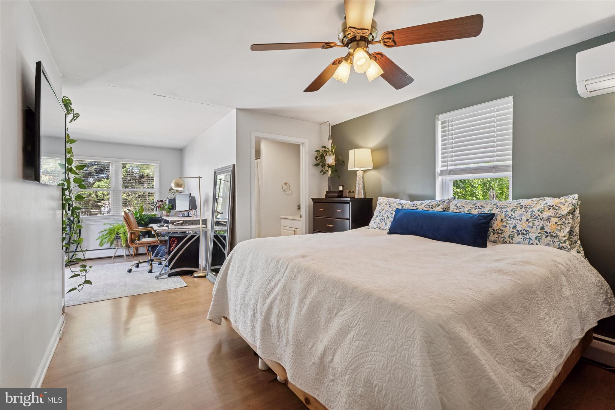 134-7 East 7 Stars Road Phoenixville, PA 19460 - Photo 9 of 25 a bed room with a bed and a chair