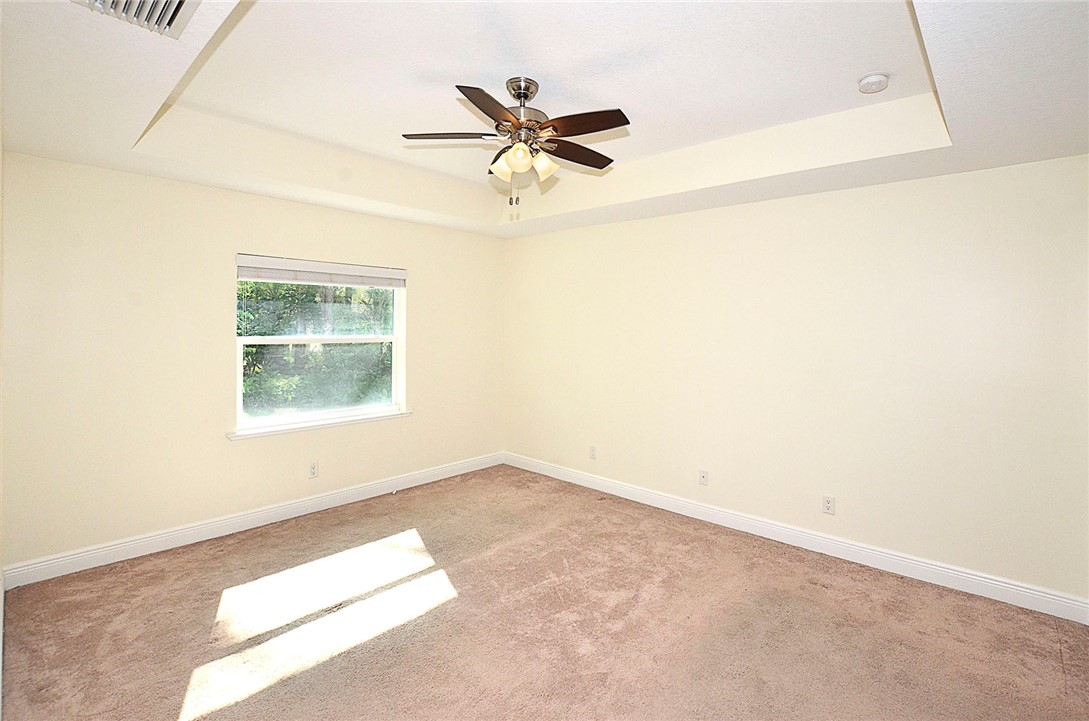 4899 Kirby Loop Road Fort Pierce, FL 34981 - Photo 13 of 32 an empty room with a window