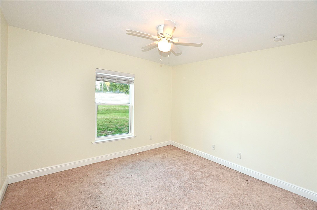 4899 Kirby Loop Road Fort Pierce, FL 34981 - Photo 18 of 32 an empty room with a window
