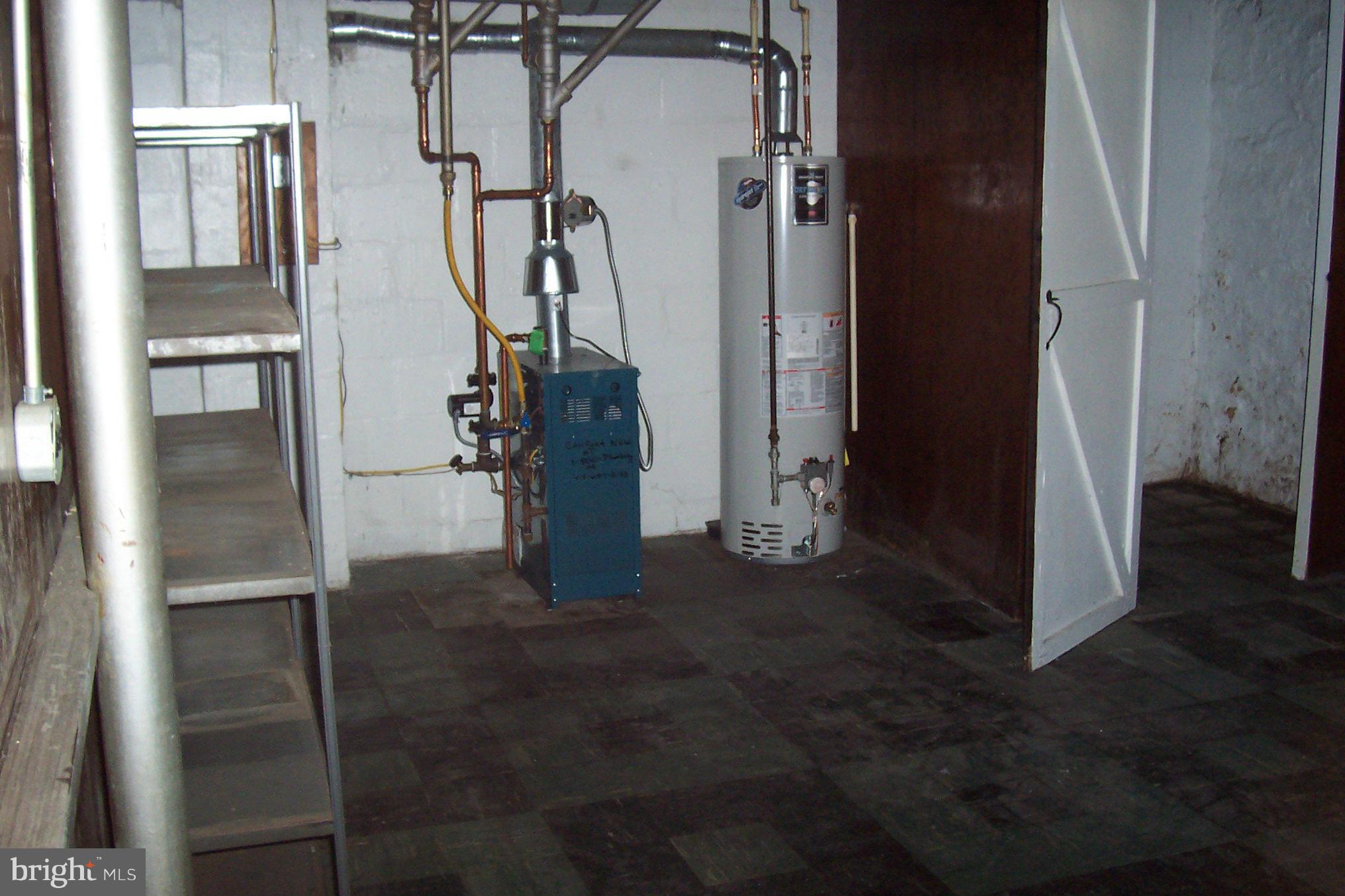 3704 Delverne Road Baltimore, MD 21218 - Photo 14 of 17 a view of water heater room