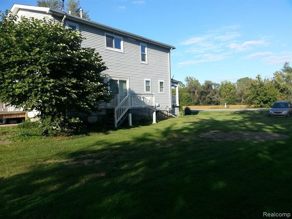 28460 Waltz Road New Boston, MI 48164 - Photo 3 of 13 deck over looking large yard.jp