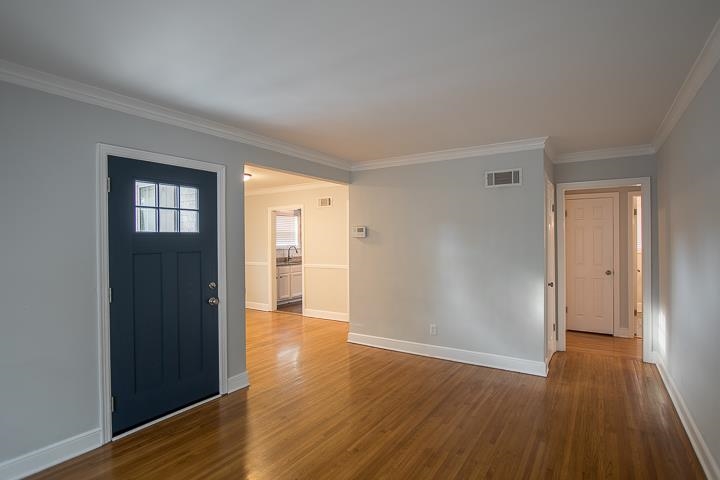3780 Cardinal Avenue Memphis, TN 38111 - Photo 3 of 19 a view of hallway with wooden floor