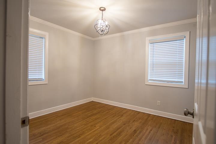 3780 Cardinal Avenue Memphis, TN 38111 - Photo 10 of 19 a view of a room with wooden floor and windows