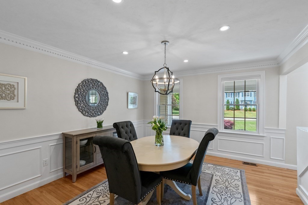 20 Walden Drive Walpole, MA 02081 - Photo 12 of 38 a view of a dining room with furniture window and wooden floor