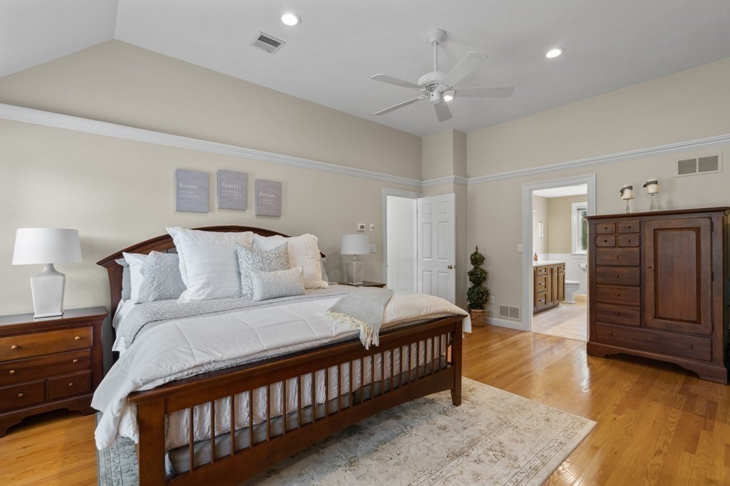 20 Walden Drive Walpole, MA 02081 - Photo 14 of 38 a bedroom with a bed and wooden floor