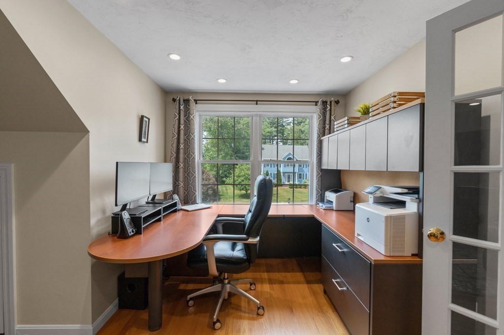 20 Walden Drive Walpole, MA 02081 - Photo 18 of 38 a view of a workspace with furniture and a window
