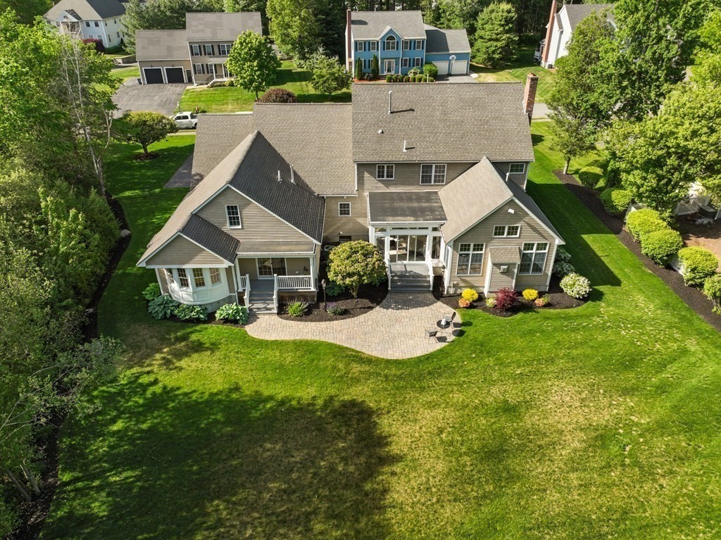 20 Walden Drive Walpole, MA 02081 - Photo 2 of 38 an aerial view of a house with swimming pool