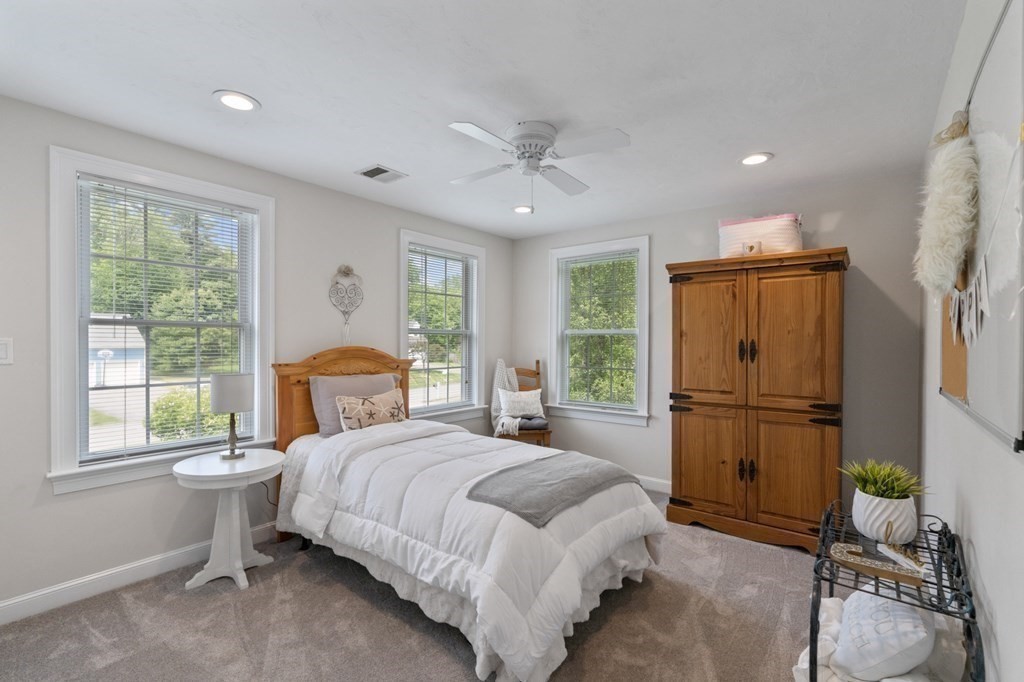 20 Walden Drive Walpole, MA 02081 - Photo 21 of 38 a bedroom with a bed dresser and a window