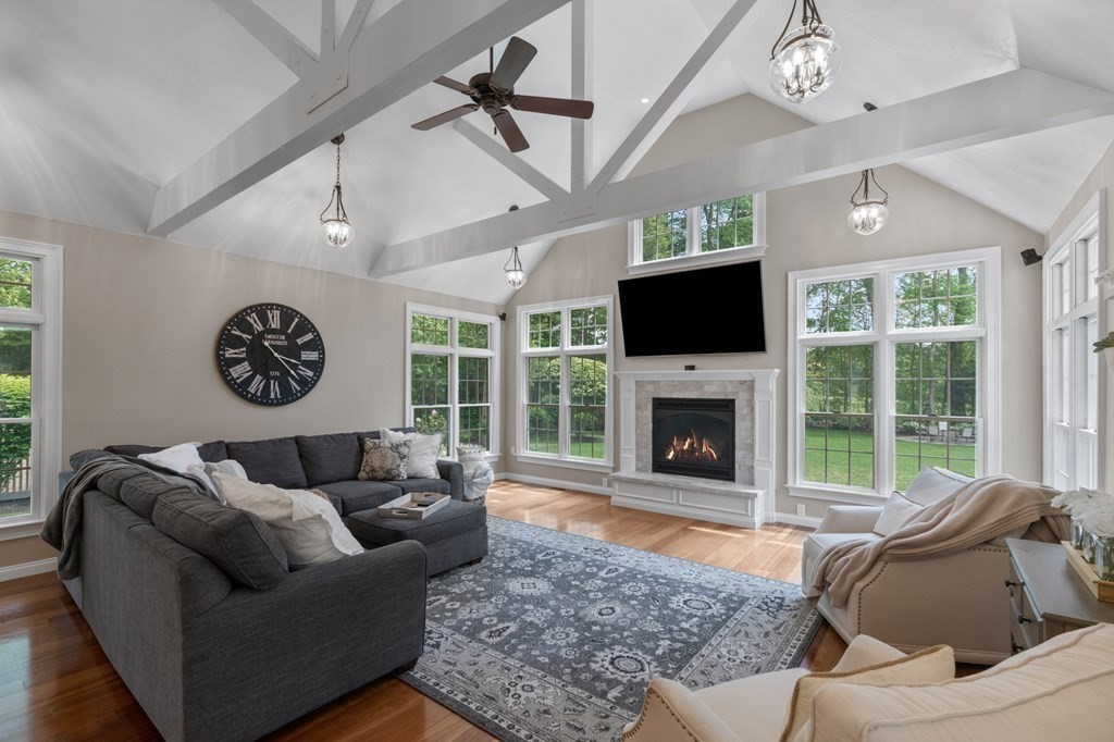 20 Walden Drive Walpole, MA 02081 - Photo 3 of 38 a living room with furniture a window and a fireplace