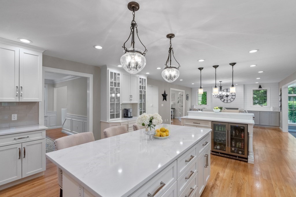 20 Walden Drive Walpole, MA 02081 - Photo 8 of 38 a large kitchen with kitchen island a large island in it