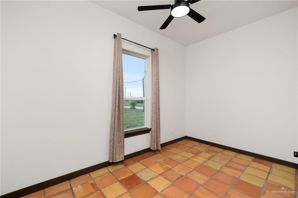 301 Pvt 755 Ranch Encino, TX 78353 - Photo 14 of 38 an empty room with a window