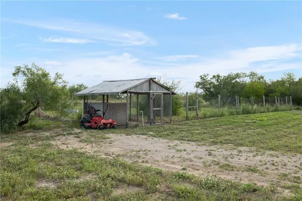 a house with yard in front of it