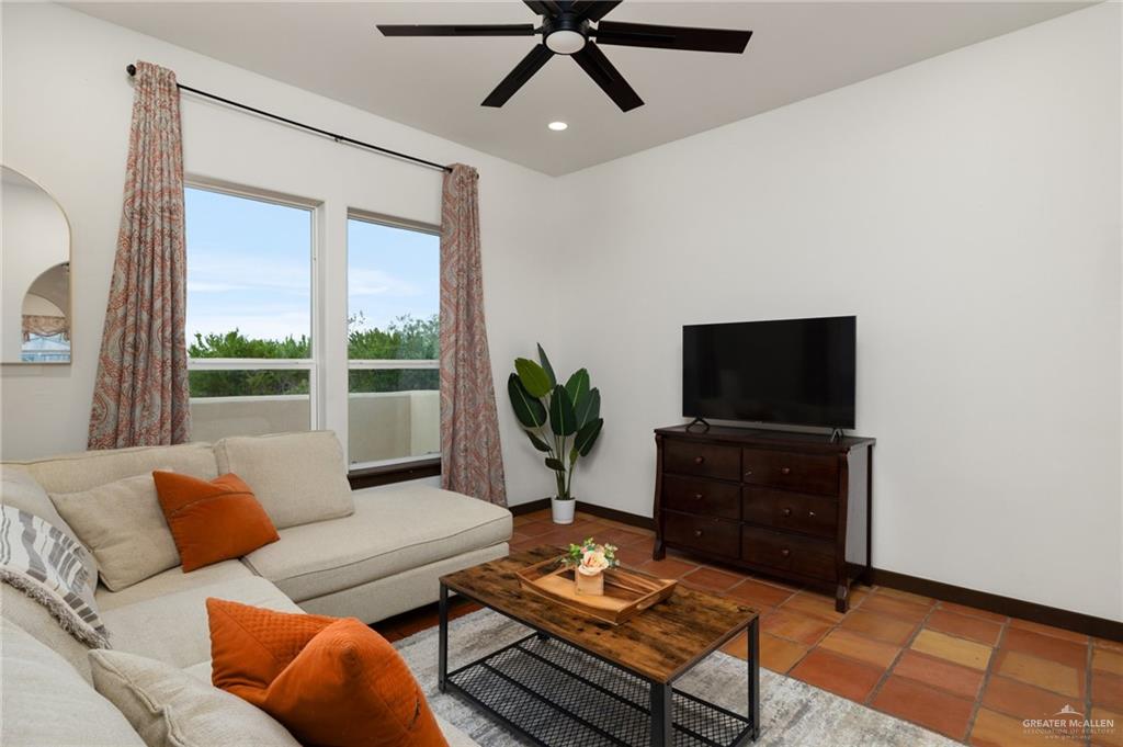 301 Pvt 755 Ranch Encino, TX 78353 - Photo 10 of 38 a living room with furniture and a flat screen tv