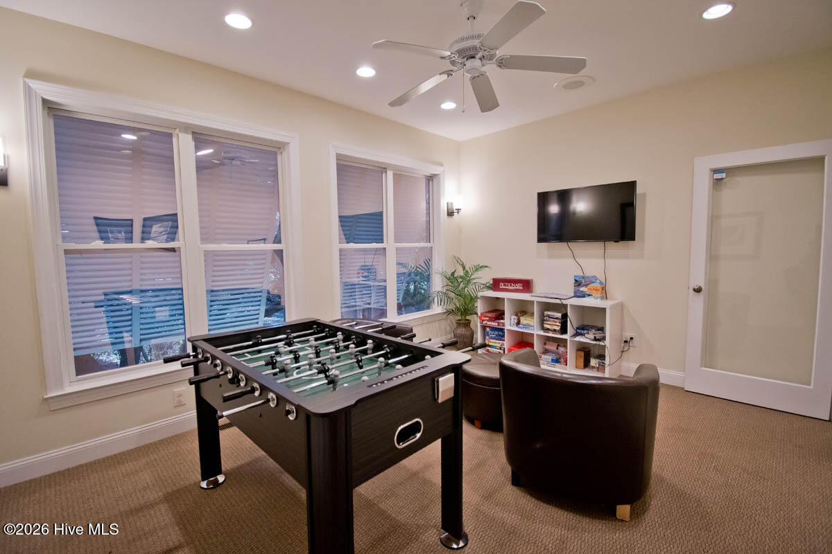 1700 Salter Path Road, Unit K102 Indian Beach, NC 28512 - Photo 41 of 45 Clubhouse TV and game room 2