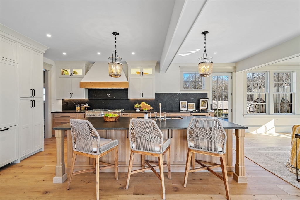 16 Hatch Farm Lane, Unit 16 Concord, MA 01742 - Photo 11 of 39 a view of a dining area with furniture