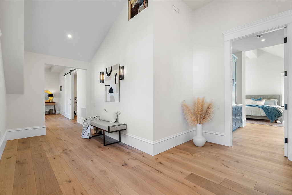 16 Hatch Farm Lane, Unit 16 Concord, MA 01742 - Photo 13 of 39 a living room with furniture and wooden floor