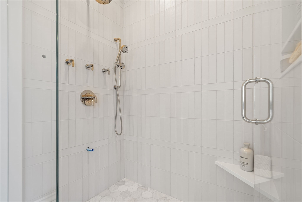 16 Hatch Farm Lane, Unit 16 Concord, MA 01742 - Photo 20 of 39 a bathroom with a shower