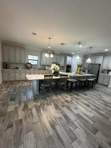 a view of a kitchen with a sink