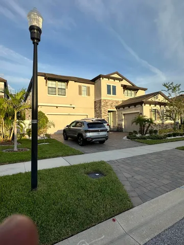 a car parked in front of a house