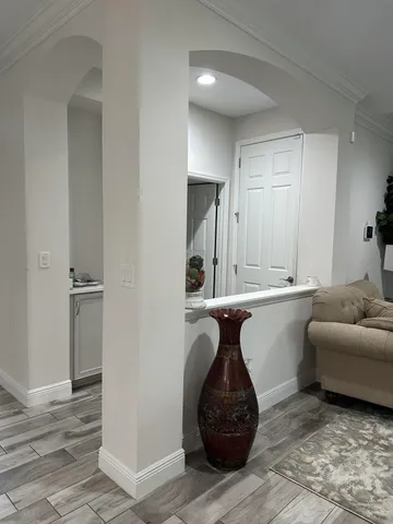 a view of a brick building next to a yard