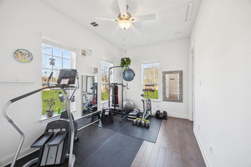 330 Bonham Boulevard Fairview, TX 75069 - Photo 16 of 32 a view of a livingroom with furniture and a workspace