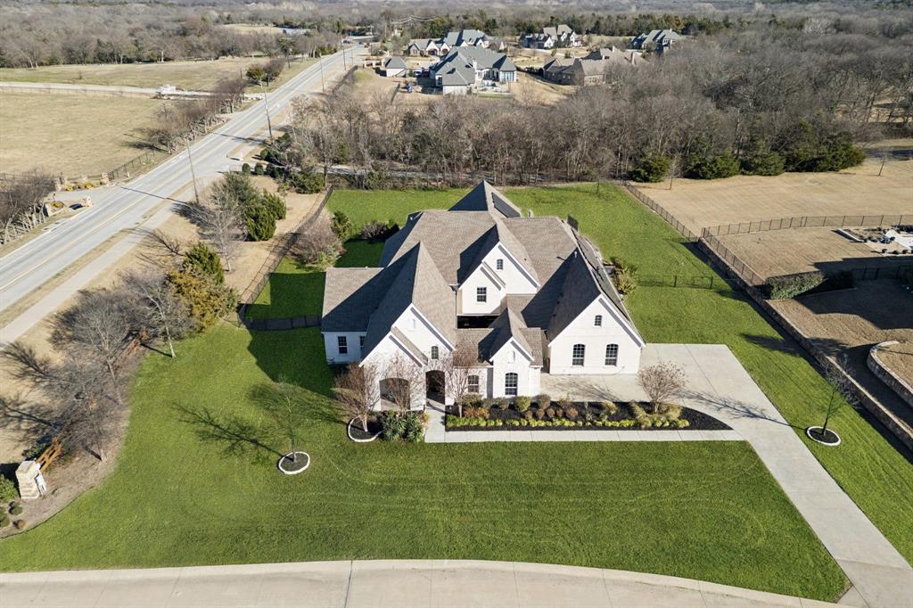 330 Bonham Boulevard Fairview, TX 75069 - Photo 28 of 32 an aerial view of a house with a yard
