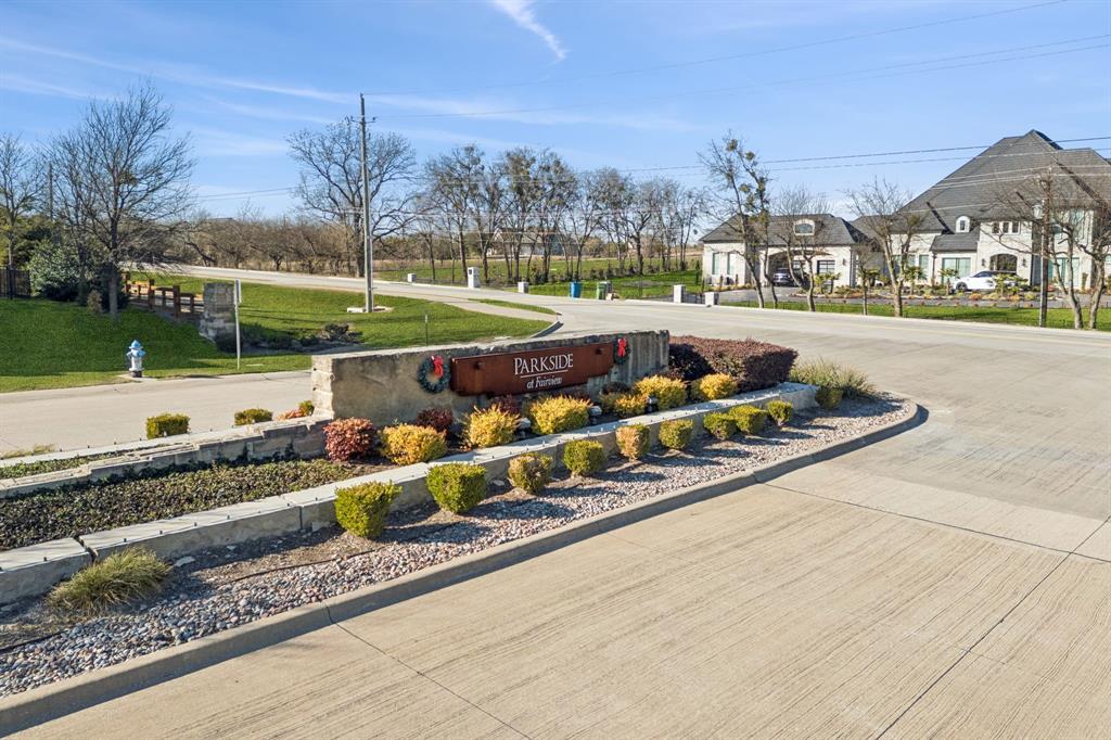 330 Bonham Boulevard Fairview, TX 75069 - Photo 30 of 32 a view of a street with a bench and trees
