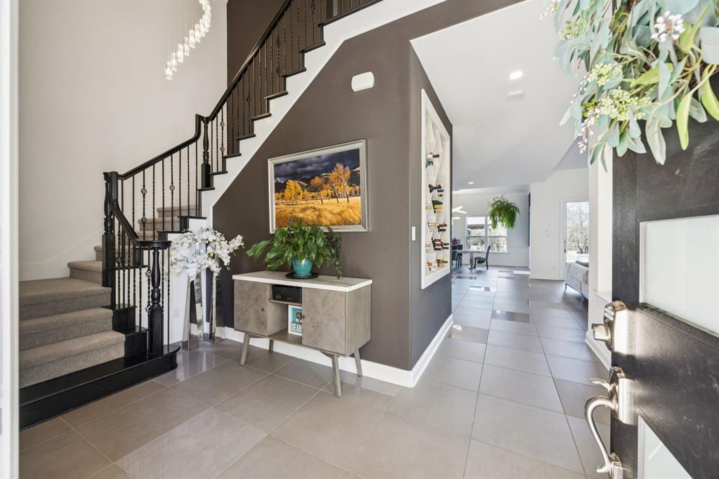330 Bonham Boulevard Fairview, TX 75069 - Photo 3 of 32 a living room with furniture and a potted plant