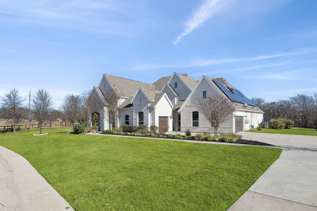 330 Bonham Boulevard Fairview, TX 75069 - Photo 32 of 32 a front view of house with yard and green space