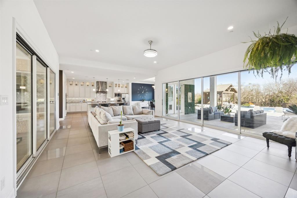 330 Bonham Boulevard Fairview, TX 75069 - Photo 6 of 32 a living room with furniture and a large window