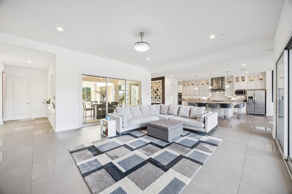 330 Bonham Boulevard Fairview, TX 75069 - Photo 7 of 32 a living room with furniture and a large window