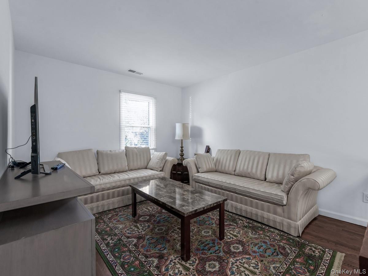 15 Fairway Circle South, Unit 15 Manhasset, NY 11030 - Photo 24 of 39 Second floor finished, unenclosed loft area, featuring wood finished floors and baseboards