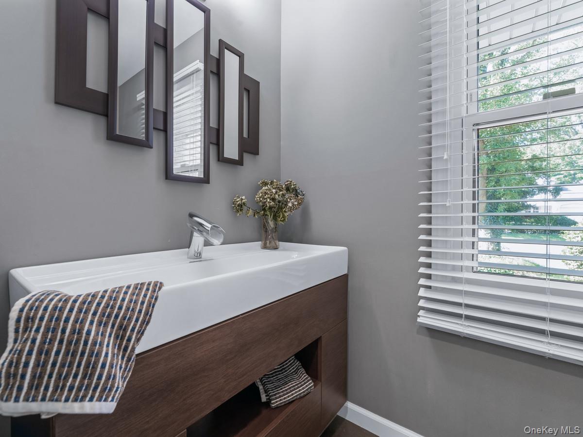 15 Fairway Circle South, Unit 15 Manhasset, NY 11030 - Photo 7 of 39 Powder Room; Half Bathroom with plenty of natural light