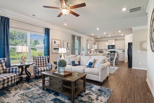 Undisclosed Address Antioch, TN 37013 - Photo 9 of 21 a living room with furniture wooden floor and a table