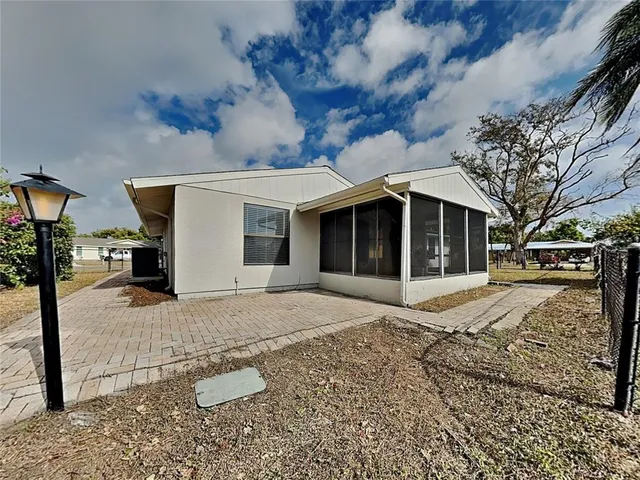 a view of a house with a patio
