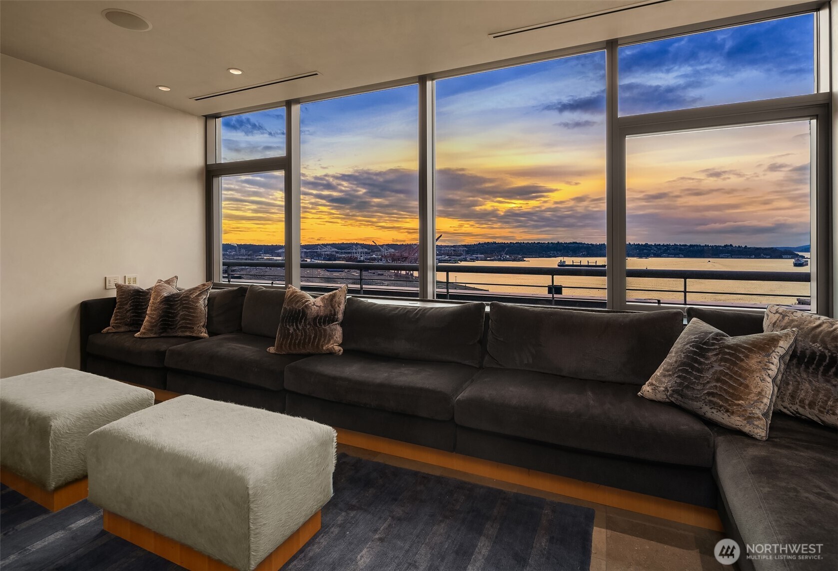 715 2nd Avenue, Unit 1501 Seattle, WA 98104 - Photo 14 of 40 a living room with furniture and a large window