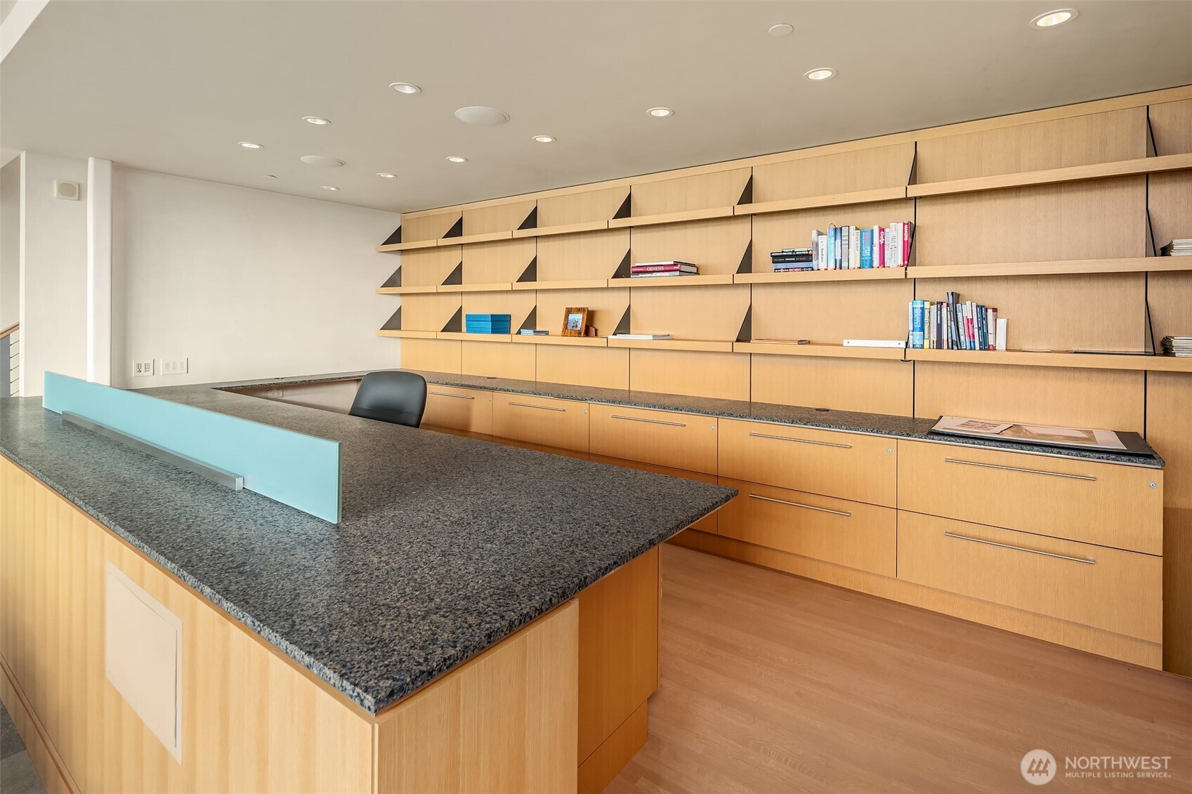 715 2nd Avenue, Unit 1501 Seattle, WA 98104 - Photo 20 of 40 a kitchen with stainless steel appliances granite countertop a sink and a refrigerator